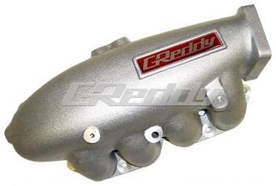GReddy Nissan SR20DET S14/S15 short runner intake plenum for stock throttle body, shown with mounting points and polished finish.