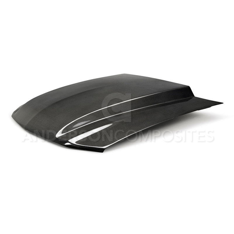 Anderson Composites carbon fiber cowl hood for 2013-2014 Ford Mustang, showcasing lightweight, aerodynamic hood design with detailed fiber weave.