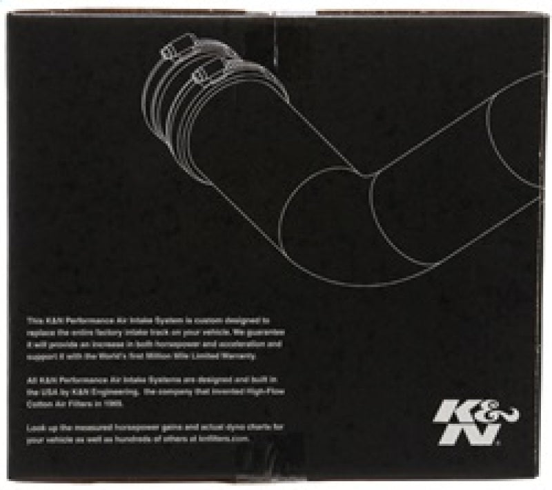 K&N Engineering Jeep Wrangler 3.6L V6 Cold Air Intake Kit installed in engine bay, featuring air filter and intake tubing for enhanced performance.