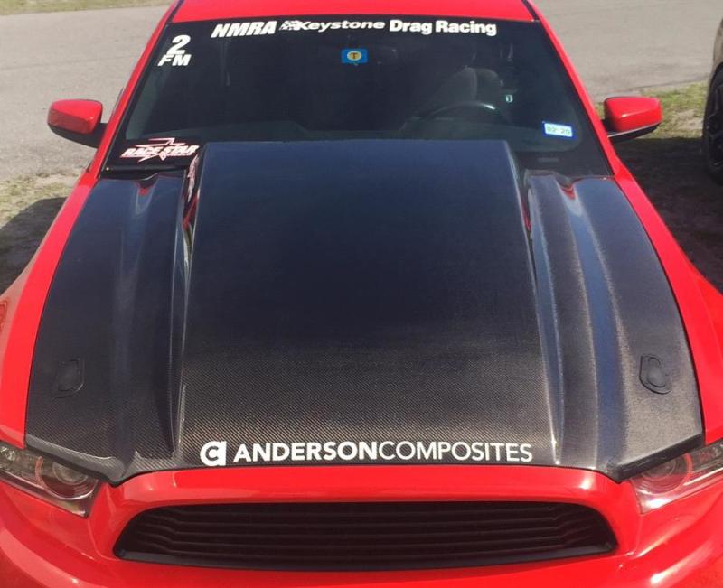 Anderson Composites carbon fiber cowl hood for 2013-2014 Ford Mustang, sleek lightweight hood with a sporty design.