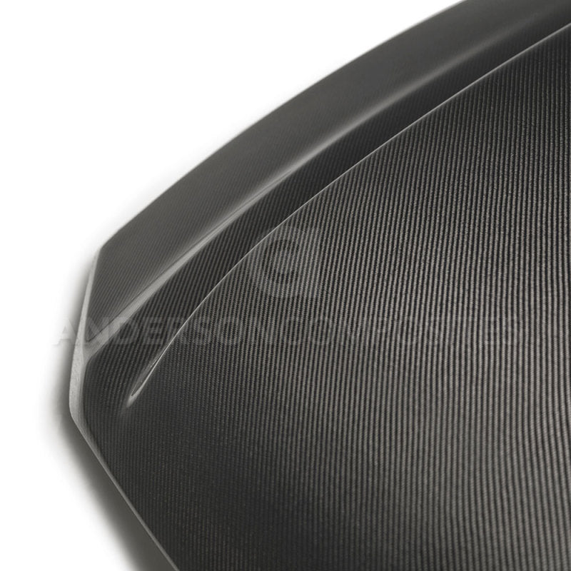 Anderson Composites carbon fiber cowl hood for 2013-2014 Ford Mustang with a sleek, aerodynamic design and prominent hood scoop