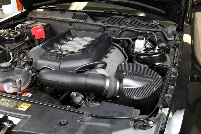 K&N Engineering Ford Mustang GT 5.0L V8 Cold Air Intake Kit with air filter and intake tubing for improved engine airflow.