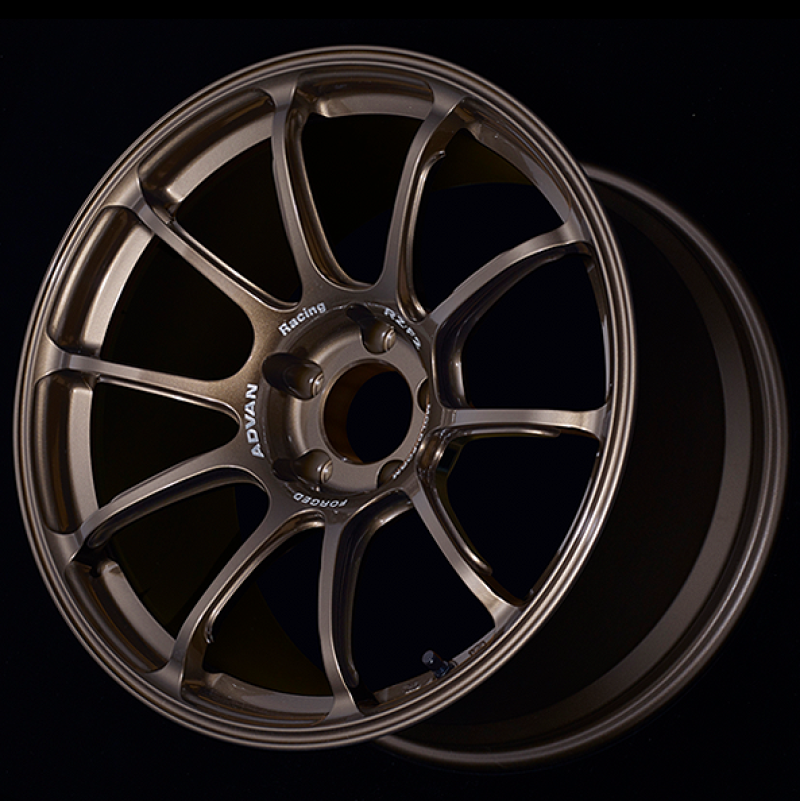 Advan RZ-F2 forged racing wheel in 18x9.5 inches, +29 offset, 5x114.3 bolt pattern, in Umber Bronze finish.